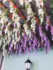 Ramas de flor de cerezo flor de durazno falsa plantas verdes de techo decoración enredaderas de flores de interior pared de celebridad de internet supermercado restaurante habitación cubierta superior fealdad