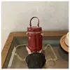 Bolsa mini redonda estilo balde com espelho a laser da moda coreana 2026 para meninas, bolsa de mão estilosa, bolsa de ombro e transversal