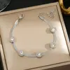 Pulseira de Aço Titânio com Números Romanos Personalizados para Mulheres, Venda Quente Transfronteiriça, Design de Nicho da Moda em Ouro 18K, Joia de Mão que Não Desbota