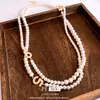 Collar de Capas con Perlas de Vidrio Perlas y Cuentas Estilo Retro Francés Cadena Larga para Suéter Estilo Palacio Joyería de Nicho Moderna y Elegante