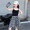 Conjunto de Verão 2025 para Meninas, Novo Estilo para Crianças Maiores, Conjunto Moderno de Saia Curta Irregular com Top Regata Falso de Duas Peças