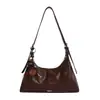 Elegante y estilosa nueva colección de otoño 2026 estilo coreano: un bolso cruzado casual, un bolso de hombro y un bolso con forma de dumpling, perfectos para el uso diario y para ir al trabajo.