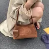 Bolso de mano de gamuza de moda para otoño 2026, estilo coreano, nuevo modelo versátil, bolso de hombro simple y elegante para llevar debajo del brazo
