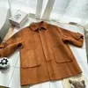 Abrigo de lana estilo coreano para niños 2026 otoño e invierno de longitud media con cuello de solapa, abrigo de lana grueso y cálido para niños pequeños y niños