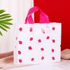 Linda bolsa de tienda de ropa con cara sonriente, bolsa de regalo, tienda de ropa para niños y niñas, bolsa de plástico portátil, embalaje de caja de zapatos, logotipo al por mayor
