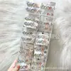 Pinza para el pelo de encaje con forma de lazo y ojos de gato con pedrería brillante en forma de corazón, estilo coreano, para niñas, adecuado para flequillo