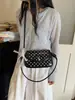 Bolso cruzado de hombro para mujer 2026 transfronterizo, nuevo y elegante, estilo nicho, con lazo, bolso de mano pequeño cuadrado de lunares de alta gama