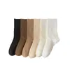 Calcetines para mujer primavera y otoño Cuatro Estaciones calcetines de media pantorrilla color liso desodorantes absorbentes de sudor estilo ins japonés calcetines de rizo para confinamiento venta al por mayor