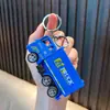 Llavero de coche cool de fricción, divertido llavero colgante de modelo de juguete de motocicleta para aliviar el estrés, al por mayor