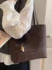 Bolsa retro grande de camurça para mulheres 2026 nova bolsa de ombro única casual para outono e inverno Bolsa tote estilo coreano para o dia a dia
