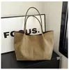 Bolso de hombro de mujer moderno y versátil 2026 nuevo modelo bolso tote retro europeo y americano esmerilado gran capacidad bolso simple para el día a día