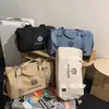 2026 Nova Bolsa de Viagem Grande Capacidade Bolsa de Mão Esportiva Bolsa de Bagagem de Viagem Estilo Coreano Transversal Bolsa Fitness