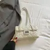 Bolso acolchado estilo Chanel para mujer, Nuevo modelo 2026, Bolso de hombro de nicho de lujo de alta gama para el trabajo y los desplazamientos, Bolso de axila