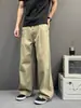 Jeans de línea A con botones y pliegues estilo retro americano desgastado para hombres y mujeres, pantalones rectos holgados de alta gama que estilizan, marca de moda