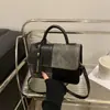 Bolso Pequeño de Diseño de Nicho para Mujer 2024 Invierno Nueva Moda Bolso Cuadrado Pequeño para Viajes Cotidianos Bolso de Hombro con Textura de Alta Calidad