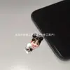 Adecuado para tapones de polvo de iPhone, accesorios de teléfono de cara sonriente, chicas transfronterizas, Ty Apple puerto de carga caricatura