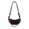 Bolso de moda tipo cuerno estilo coreano para mujer, nuevo bolso de hombro de nicho francés 2026, bolso cruzado único, bolso de media luna moderno