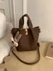 Bolso Cubo Retro Texturizado Estilo Coreano para Mujer Otoño e Invierno 2025 Nuevo Nicho Lujo Accesible Versátil Estilo Extranjero Bolso de Hombro Único Cruzado