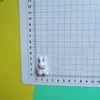 Coelho Fofo Sentado de Desenho Animado Usando Cachecol Resina DIY Capa de Celular Elástico de Cabelo Acessório de Cabelo Fivela de Sapato Material Acessórios Atacado