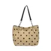 Bolso tote de lunares nuevo 2026, gran capacidad, diseñado para el trabajo, un bolso de mano diario elegante y único
