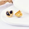 Aretes de moda de alta gama estilo coreano con forma de corazón de gota de pegamento personalizado, aretes nicho de elogio con retención de color de acero inoxidable