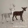 Animal de simulación ciervo sika simulación alce jirafa modelo animal de piel accesorios de decoración para cine y televisión venta al por mayor