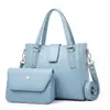 Bolsa de Mujer 2026: Bolso cruzado de un solo hombro, brillante, de alta gama, simple y elegante, con una atmósfera vintage, Set de dos bolsos tote