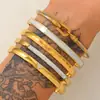 Nuevo brazalete de acero inoxidable 2026, un artículo popular y elegante para ventas transfronterizas en Europa y EE. UU., con un diseño delicado y lujoso con piedras de circonita cúbica microincrustadas, un brazalete de alta gama para mujer
