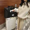 2025 bolsa de almacenamiento para ropa de mudanza acolchada de doble capa transfronteriza bolsa de equipaje portátil con ruedas al por mayor