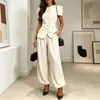 Colección de verano 2026 para mujeres europeas y americanas: conjunto de top y pantalón de color liso, corte slim, abotonado, moderno y versátil