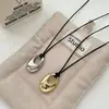 Nuevo Collar Ovalado Liso, Colgante de Diseño Simple y Moderno, Lujo Ligero Retro, Cadena de Suéter de Alta Gama Personalizada