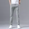 Hong Kong 2026 Otoño Nuevos Pantalones Casuales para Hombre Corte Delgado Estilo Coreano Elásticos Versátiles Pantalones de Alta Gama para Hombre para Primavera y Otoño