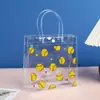Bolsa de mano transparente de PVC Bolso de compras de puesto de alta gama Bolsa de regalo de plástico de cumpleaños Bolsa para joyas de flores