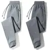 Calças Casuais Masculinas Primavera Outono Inverno Calças Esportivas Engrossadas Calças Skinny Largas Tamanho Plus Calças Longas de Cor Sólida