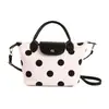Bolso tipo baguette de diseño de nicho estilo francés, bolso tipo dumpling moderno y a la moda, versátil para el uso diario, bolso de hombro moderno para llevar debajo del brazo