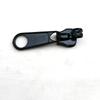 Fabricantes de Zhejiang 5# cabeza de cremallera de ojo de cerradura de nylon Estuche de equipaje Cremallera Candado de Metal cabeza de cremallera especial