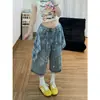 Falda de cuadros en contraste con diseño de salpicaduras de tinta, shorts de mezclilla para mujer, nuevos pantalones cropped estilo americano de primavera 2026