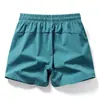 Shorts Casuais Masculinos de Cor Sólida Largos, Shorts Masculinos de Seda Gelada, Shorts de Praia Respiráveis Elásticos, Shorts Masculinos
