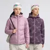 Chamarra de plumas con capucha para mujer, reversible, impermeable y con un toque de alta gama