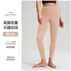 Calças de yoga com sensação de segunda pele para levantar o bumbum com efeito bumbum de pêssego, bolsos, alta elasticidade, sem costura, secagem rápida para corrida e yoga para mulheres atacado