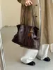 Bolsa Grande Capacidade Retrô Feminina 2026 Nova Outono Casual Bolsa de Ombro Estilo Coreano Simples Prática Bolsa Tote para o Dia a Dia