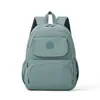 Nova Mochila de Nylon Leve para Mulheres Simples para o Dia a Dia Viagem Mochila de Grande Capacidade Impermeável Bolsa Escolar Estilo Moderno Versátil
