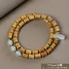 Pulseira de contas de oração budista de madeira crua natural, vendida a quente, sândalo dourado, sândalo Barbie, pulseira colecionável para homens e mulheres, fornecimento para live-stream
