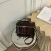 Bolsa caja de maquillaje de alta gama para mujer, nuevo bolso de mano exquisito vintage esmerilado 2026, bolso versátil de hombro y cruzado
