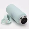Nueva Botella de Agua Deportiva 316 Proceso de Pintura de Goma Acero Inoxidable Botella Espacial Asa Deportiva al Aire Libre Taza Térmica