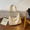 2026 Nueva Bolsa de Hombro Simple de Gran Capacidad para Viajes Diarios Bolso Tote de Nicho Bolso Cruzado de Color Sólido Moderno y Tendencia