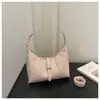 Bolso de Axila de Nicho para Mujer 2026 Nuevo Primavera Gama Alta Lujo Ligero Versátil para el Viaje Diario Bolso de Hombro Único Cruzado