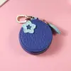 Bolsa para monedas de cuero PU transfronteriza, nueva mini billetera con patrón de lichi y fruta, lindo accesorio de bolsa para auriculares con oreja colgante para mujer