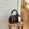 Bolsa pequena de alta qualidade feminina primavera e verão 2026 novo estilo bolsa transversal moderna bolsa de mão feminina bolsa Boston bowling