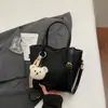 Bolsa feminina super estilosa 2026 nova moda primavera bolsa de ombro transversal bolsa balde retrô chique para o dia a dia